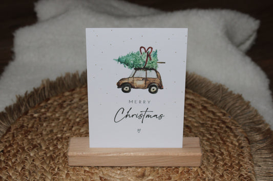 Weihnachtspostkarte - Auto mit Weihnachtsbaum